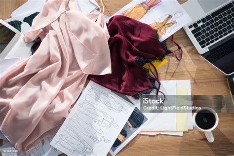 Top View Of Messy Fashion Designer Workplace Stock Photo Download