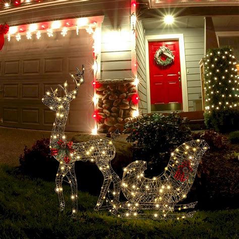 The Holiday Aisle Reindeer And Sleigh Holiday Lighted Display Set