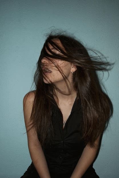 Premium Photo Close Up Of Young Woman With Tousled Hair