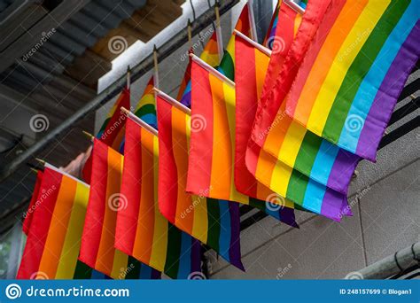 Closeup Of A Line Of Rainbow Flags Hung Above The Stonewall Inn Gay Bar And National Historic