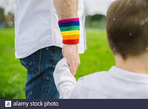 Gay Father And His Adopted Son Walking In The Park Lgtb And Stock Photo Alamy