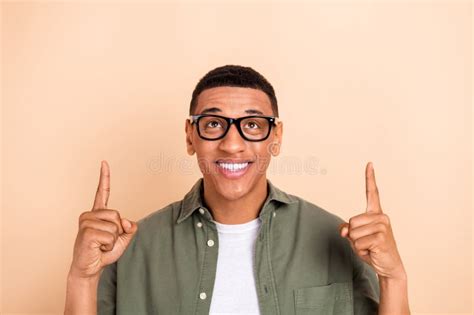 Photo Of Positive Cheerful Handsome Guy Dressed Khaki Shirt Glasses Directing Look Up Empty