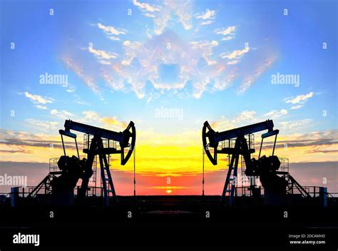 Oil Drilling Derricks At Desert Oilfield For Fossil Fuels Output And