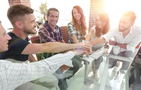 Creative Business Team Putting Hands Together At The Office Stock Image