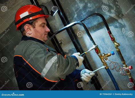 Plumber Technician Works With Valve And Pipes Stock Image Image Of