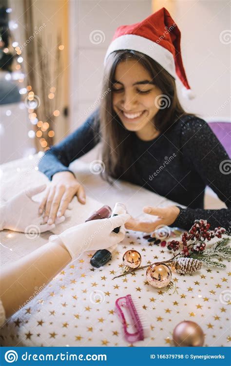 Happy Woman Having A Manicure At Nail Salon Stock Photo Image Of Face