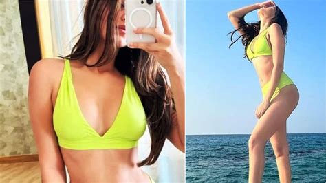 Tara Sutaria Turns Into Beach Babe Looks Uber Glamorous In Neon Bikini