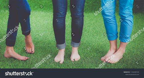 Three Women Naked Feet Standing Grass Stock Photo 1134299105 Shutterstock