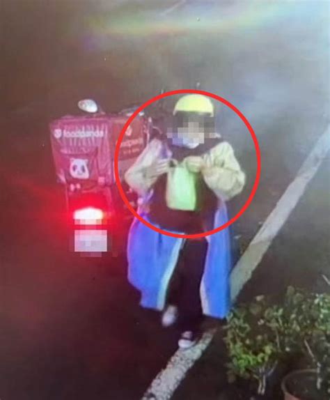 Shocking Video Delivery Driver Caught Eating Customers Fried Chicken Order On Doorbell Camera