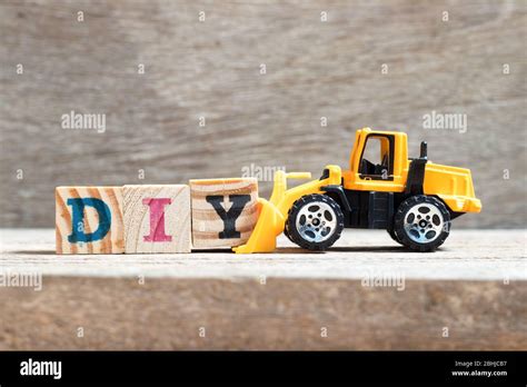 Toy Bulldozer Hold Letter Block Y To Complete Word DIY Abbreviation Of