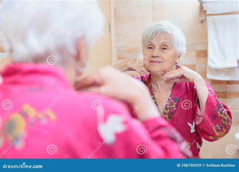Mature Woman Taking Care Of Her Face Stock Image Image Of Manual Skincare