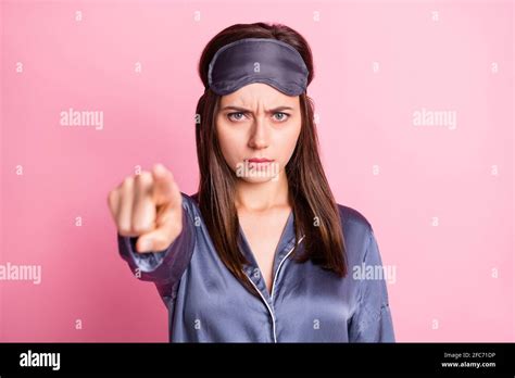 Photo Portrait Of Angry Girl Pointing Finger At Camera Isolated On Pastel Pink Colored