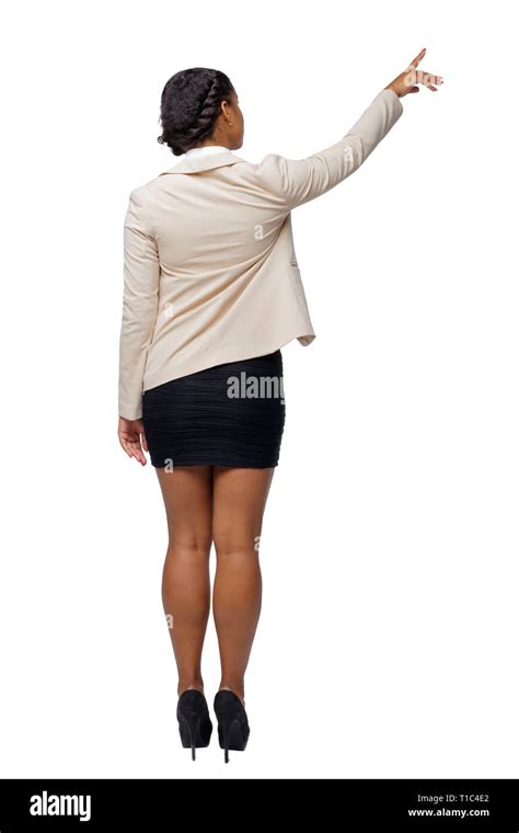 Back View Of A Black African American In A Suit That Points With His