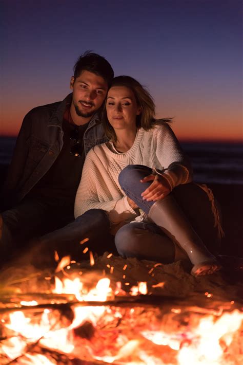 portrait of young Couple enjoying at night on the beach - Double JJ Resort