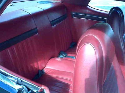 1967 Mercury Cougar red vinyl interior