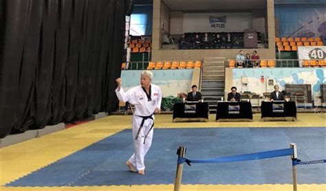 Master De Earns Taekwondos Highest Black Belt Dan