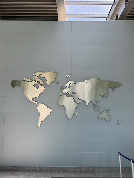 Premium Photo | World map image at the airport on the wall