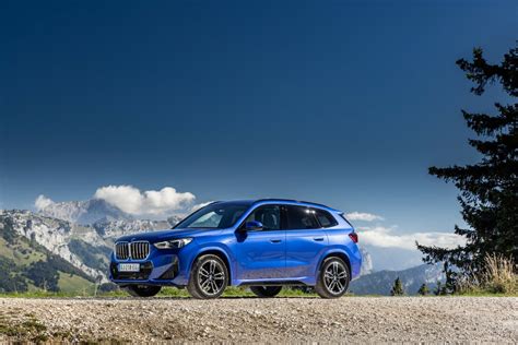 2023 Bmw X1 M Portimao Blue Poses For The Camera For France Premiere