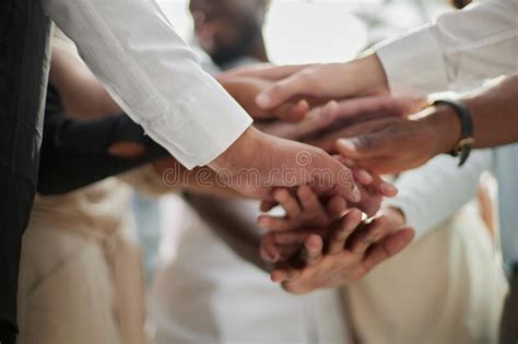 High Angle View Of Multiracial Friend Stacking Hand Together Stock