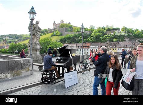 Piano Player On The Bridge Over The River Main Wurzburg Northern