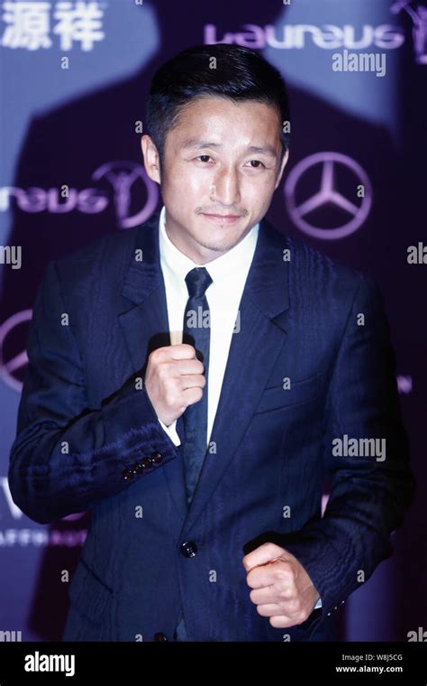 Chinese boxer Zou Shiming poses on the red carpet for the 2015 Laureus ...