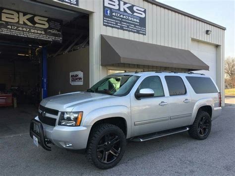 2013 Suburban Z71 With 2 Lift And 33s On Black 22 Replica Wheels