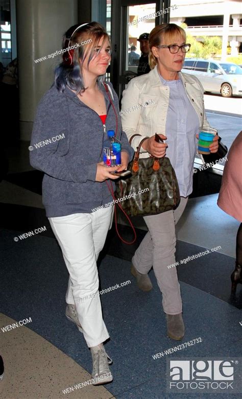 Patricia Arquette arrives at LAX with her daughter Harlow Olivia ...