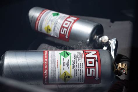 Closeup of Some Nitrous Oxide Cylinders in a Trunk of a Car Editorial ...