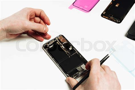 Smart Phone Battery Change Repair Maintenance | Stock image | Colourbox