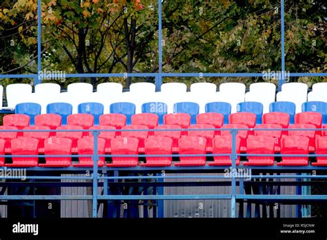 Grandstand Stadium With Many Colored Seats Outdoors Front View Stock