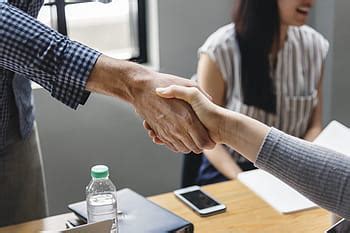 man holding  white printer paper business contract