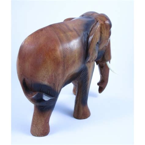 Eléphant sculpté en bois de Suar 23X22