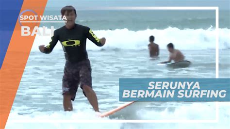 Mencoba Taklukkan Ombak Pantai Kuta Dengan Bermain Surfing, Bali