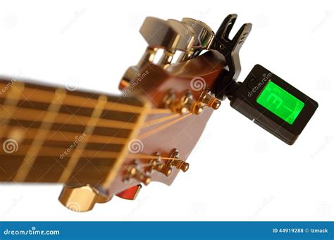 Detail of Acoustic Guitar with Guitar Clip Tuner Stock Photo - Image of ...