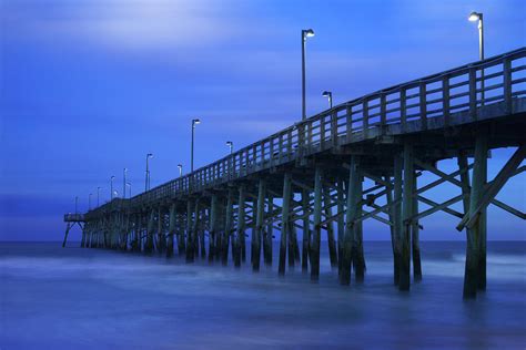 Jolly Roger Pier After Sunset Photograph By Mike Mcglothlen Pixels