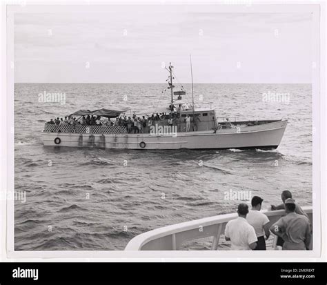 Photograph Of A Privately Owned Boat Carrying About 86 Refugees Is