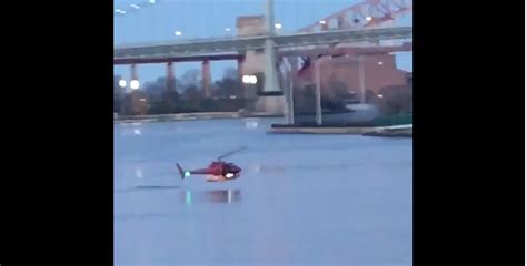 Helicopter Crashes Into New Yorks East River Video