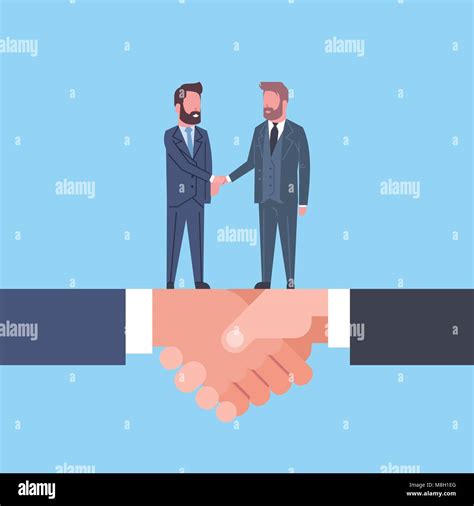 Two Businessmen Shaking Hands On Handshake Business Agreement And