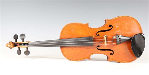 A three-quarter-size violin, length of back excluding button 33.4cm, cased.