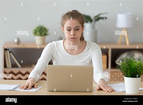 Confused Student Looking Laptop Screen Hi Res Stock Photography And