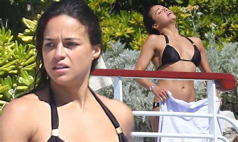 Michelle Rodriguez Shows Off Her Slim Figure In A Simple Black Bikini