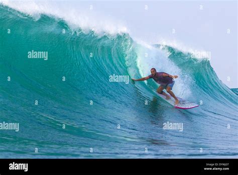 Surfing a wave. Bali island. Indonesia Stock Photo - Alamy