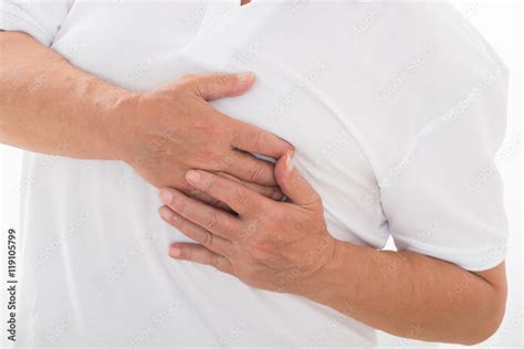 Person Suffering From Heart Pain Stock Photo | Adobe Stock