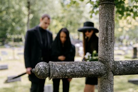 Close-up of Flowers on a Grave · Free Stock Photo