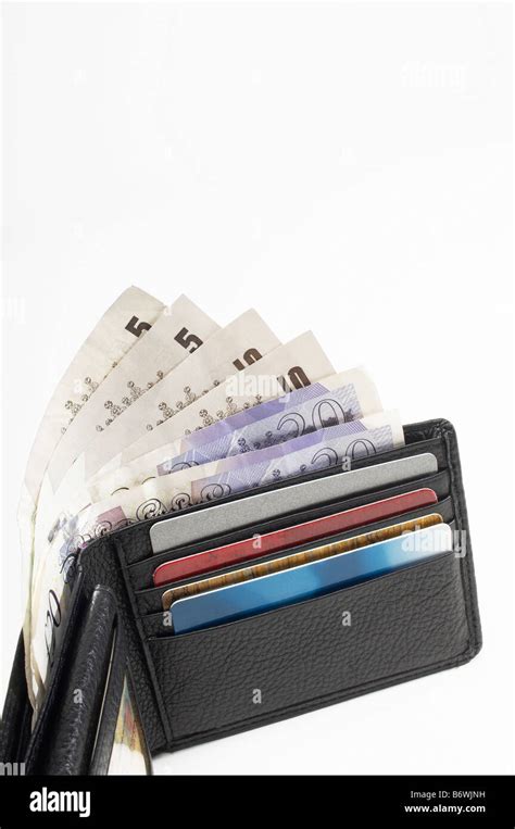 Wallet Full of Money Stock Photo - Alamy