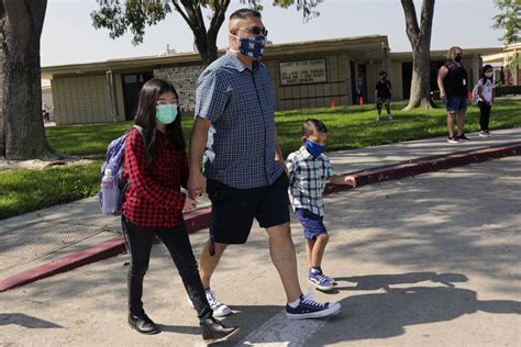 Orange County schools reopen amid parent, teacher concerns - Los ...