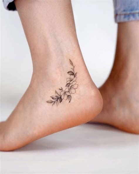 Small Black And White Flower Ankle Tattoo Cute Ankle Tattoos Ankle