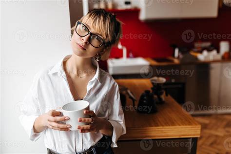 Woman Enjoying Coffee Flavour With Closed Eyes Smiling Blonde Girl In