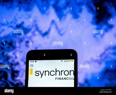 Synchrony Bank logo seen displayed on smart phone Stock Photo - Alamy