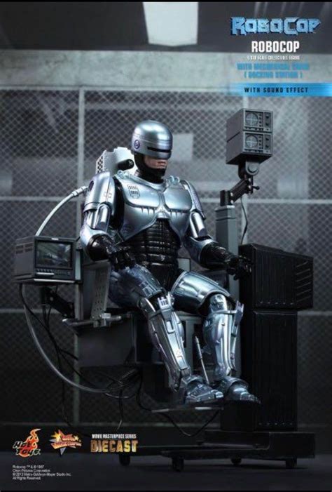 Hot Toys RoboCop Figure With Mechanical Chair Docking Station MMS203D05 Plus Arm Machine Gun